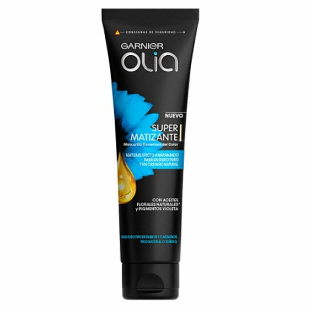 Schwarze Tube Garnier Olia Super Matizante Maske. Blaue Blume und gelber Tropfen. Text: Nuevo, Super Matizante, Mascarilla Correctora Color.