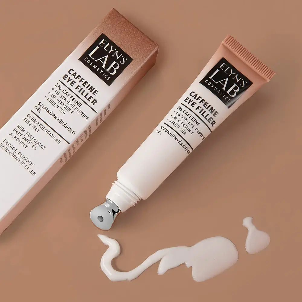 Creme-Tube und Verpackung 'ELYN'S LAB Caffeine Eye Filler'. Enthält Koffein, SYN-EYE-Peptid, Vitamin E und Grüntee. Mit Applikator.