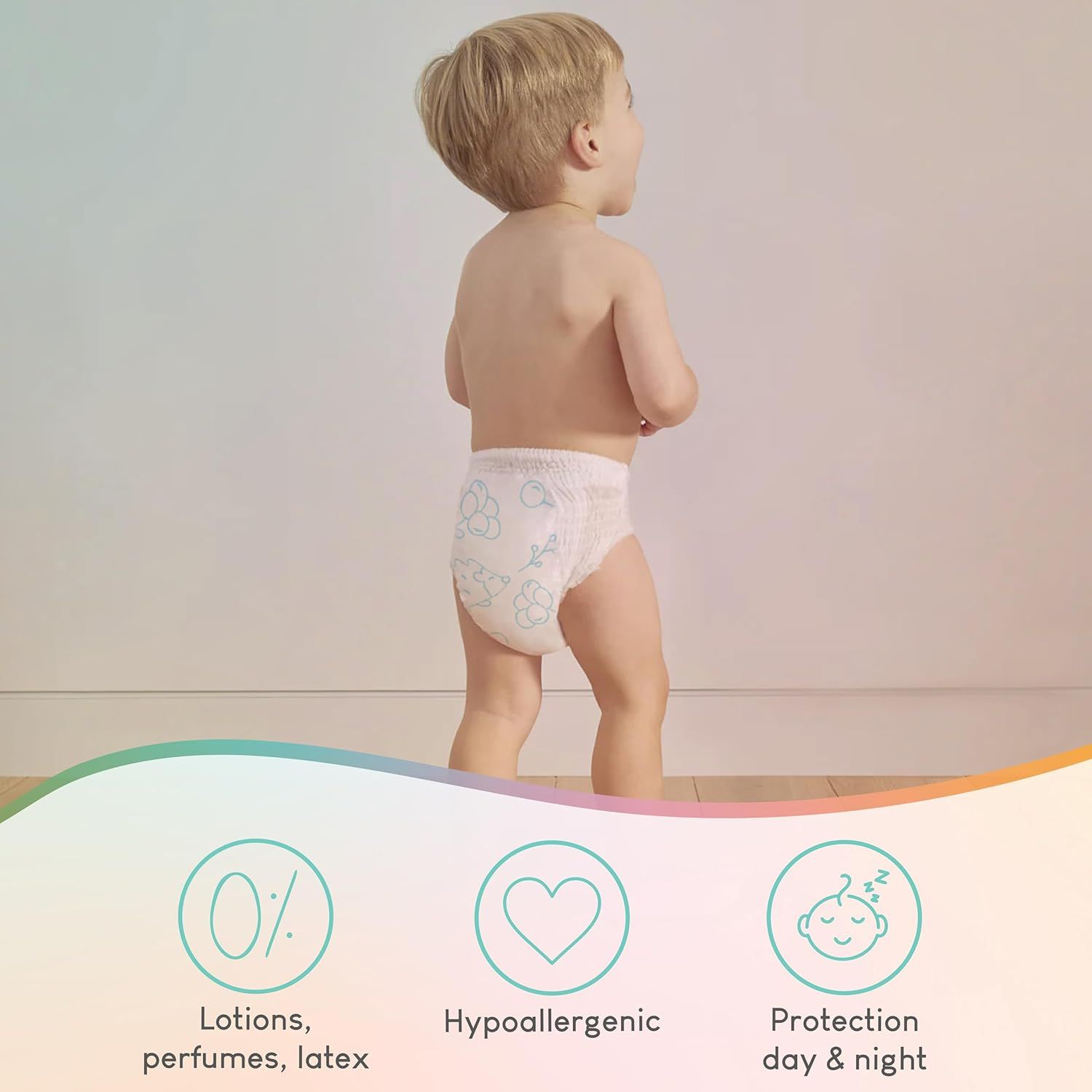 Kleinkind mit Pillo Pants Windel. Aufdruck: Pfoten. Text: 0% Lotionen, hypoallergen, Schutz Tag & Nacht.