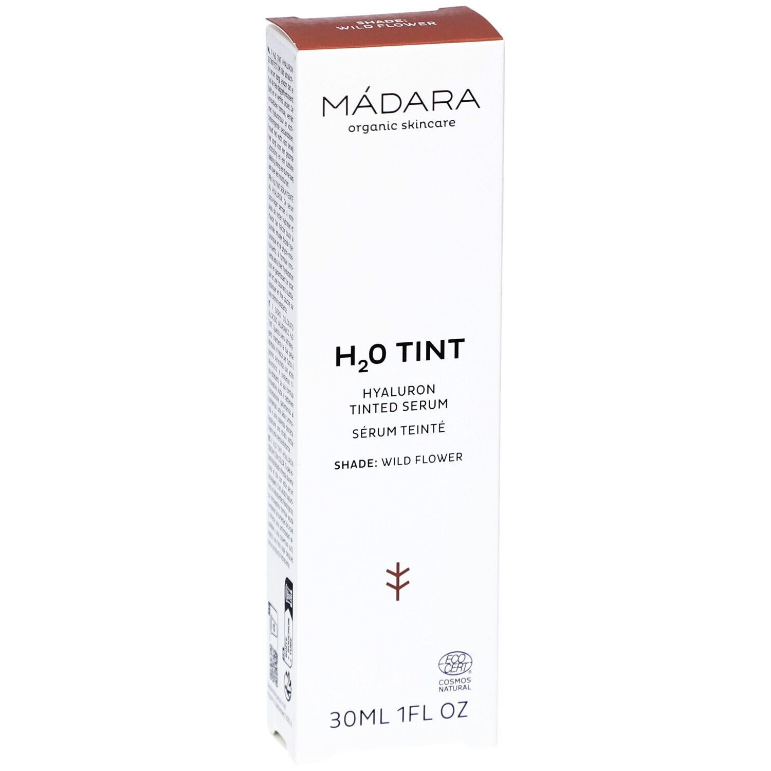 Weiße Produktverpackung mit braunem Deckel. Aufschrift: MÁDARA, H2O TINT, Hyaluron Tinted Serum, Shade: Wild Flower. 30ml.