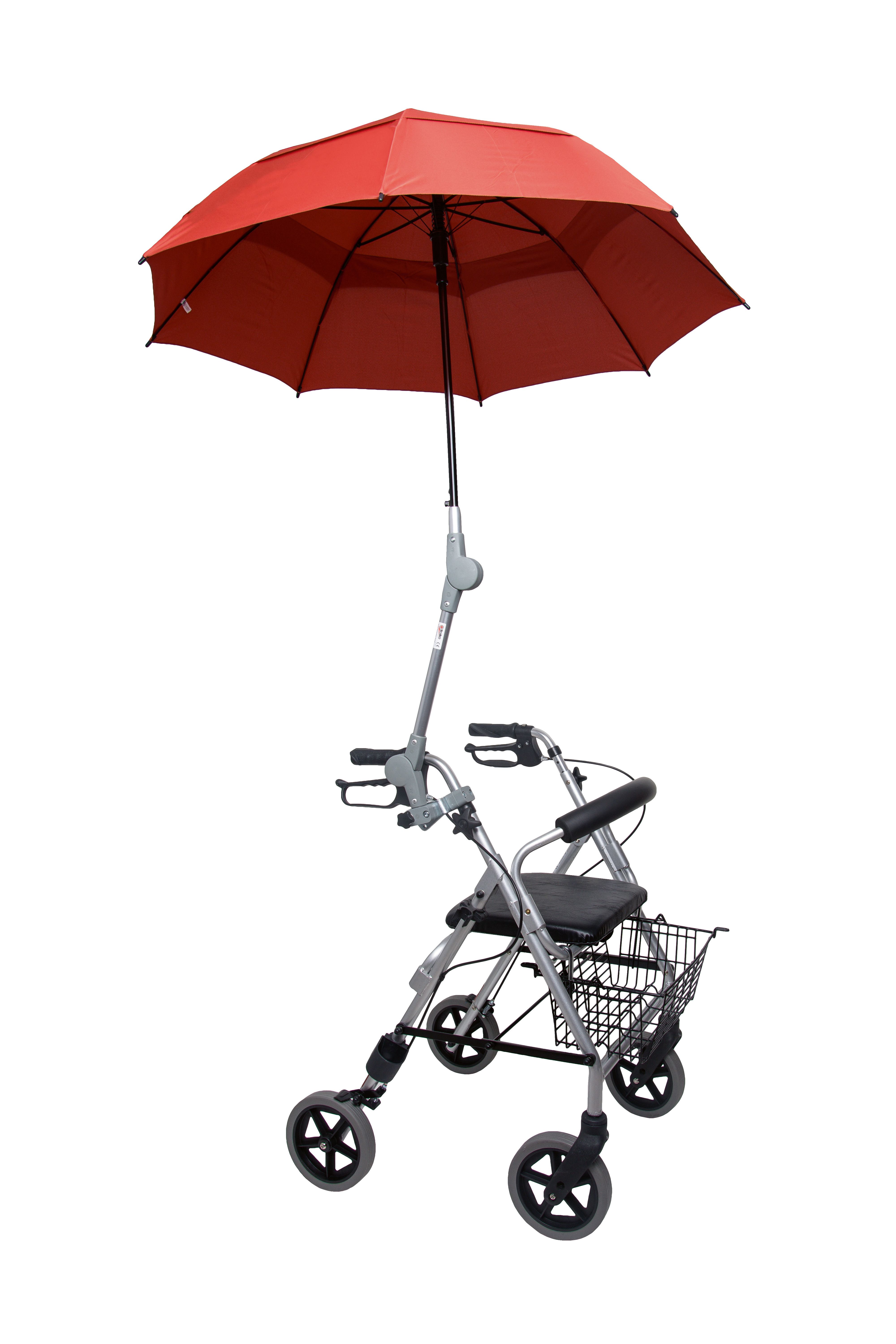 Rollator mit rotem Sonnenschirm. Der Schirm ist geöffnet und über dem Rollator positioniert. Grauer Rahmen, schwarze Räder.