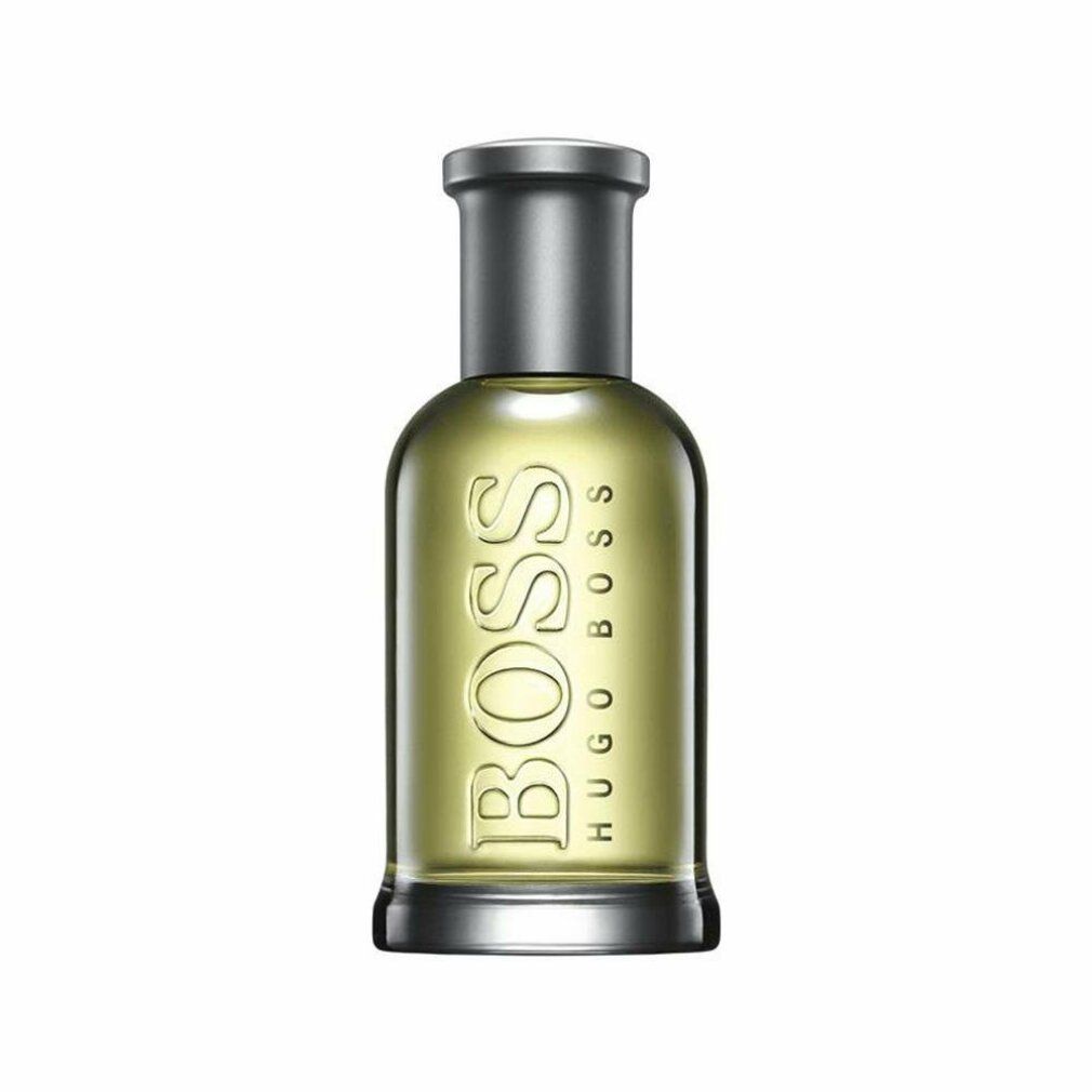 Boss Bottled Eau de Toilette Flakon. Glasflakon mit silbernem Verschluss. Logo und Produktname sichtbar.