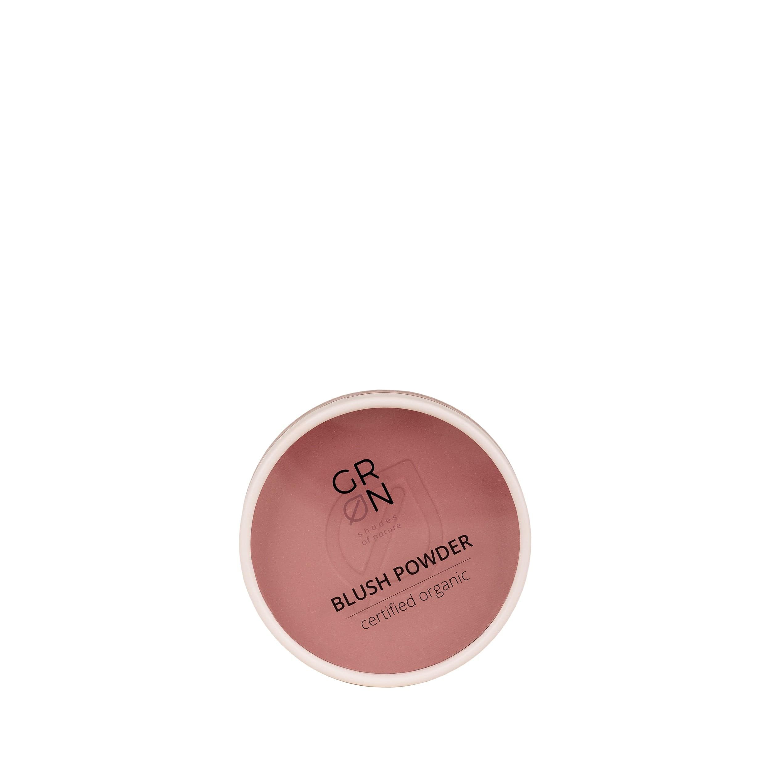Runder Blush-Puder-Behälter, rosewood. Weißer Rand, rosa Inhalt. Schriftzug: GRN, Blush Powder, certified organic.