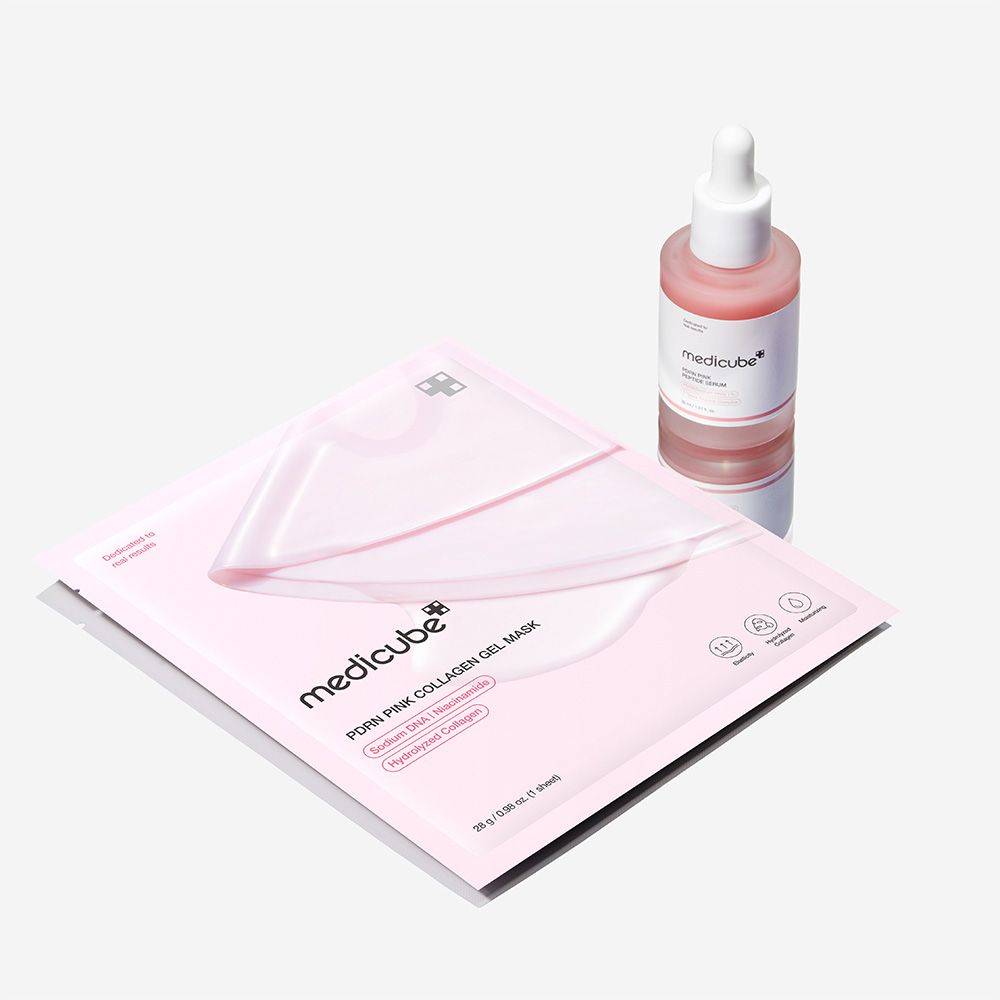 Ein Poren-Pink-Kollagen-Gel-Maskenpaket und eine Pipettenflasche mit rosa Serum von Medicube.