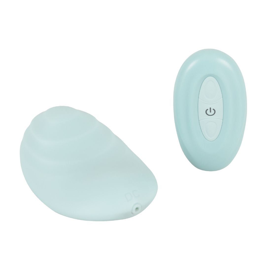 Hellblaues, ovales Gerät mit einer Taste und einem abgerundeten, tropfenförmigen Teil. Beide Teile liegen getrennt.