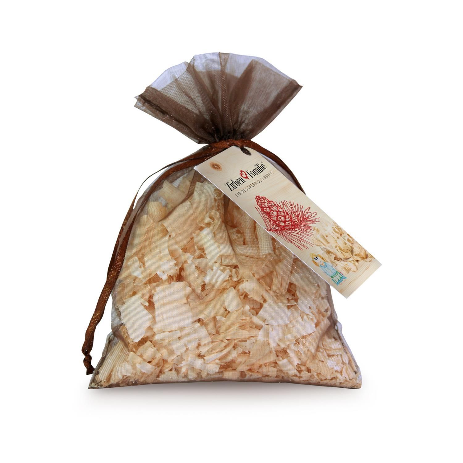 Beutel mit Holzflocken, brauner Verschluss, Anhänger mit Logo und Text.