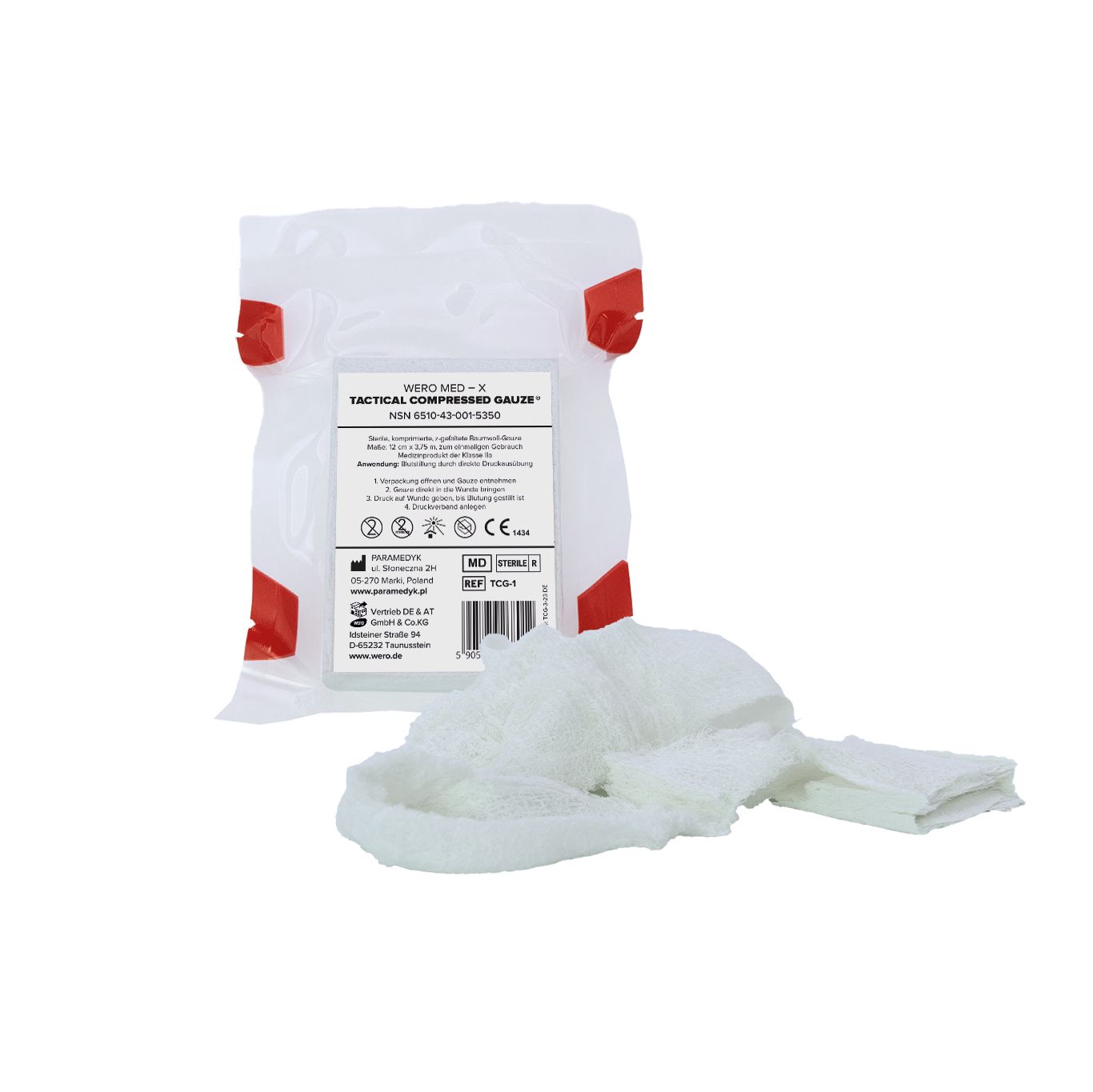 Komprimierte Gaze, weiß, teilweise entfaltet. Verpackung mit rotem Verschluss. Aufschrift: WERO MED-X® TACTICAL COMPRESSED GAUZE®.