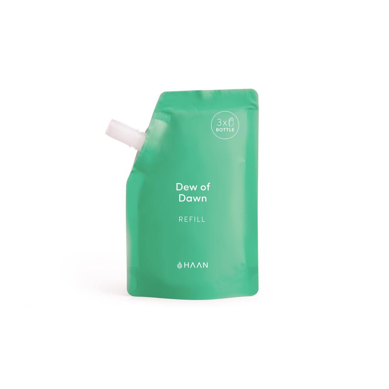 Grüner Nachfüllbeutel mit weißem Ausgießer. Aufschrift: Dew of Dawn Refill. Marke: HAAN. Oben: 3x Flaschen-Symbol.