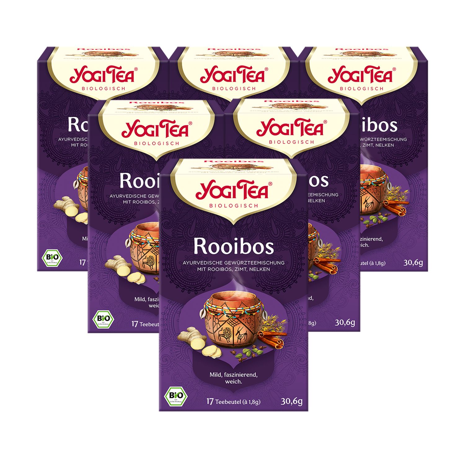 Sechs Packungen Yogi Tea Rooibos. Lila Verpackung mit Logo, Produktname und Zutaten. Bio-Siegel.