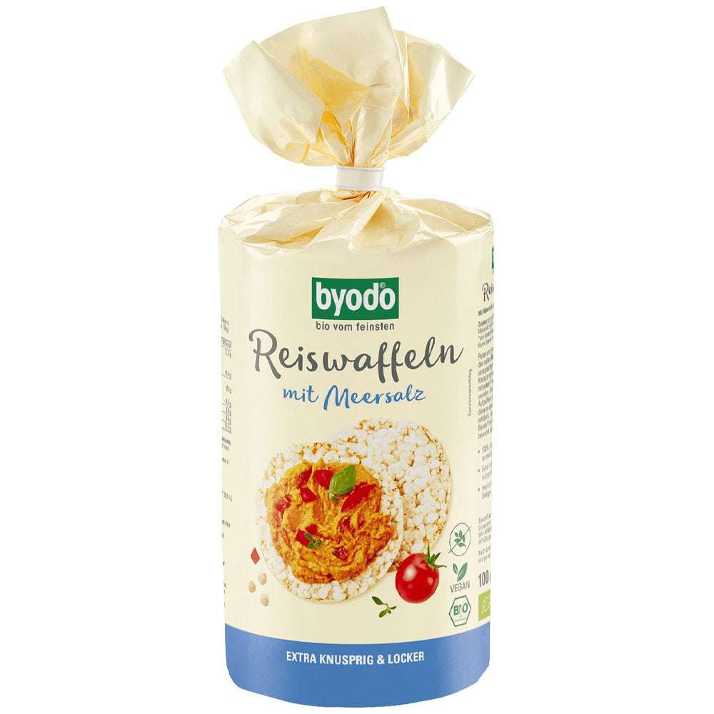 Verpackung von Reiswaffeln mit Meersalz. Marke: byodo. Bio-Siegel. Abbildung von Reiswaffeln mit Belag und Tomate.
