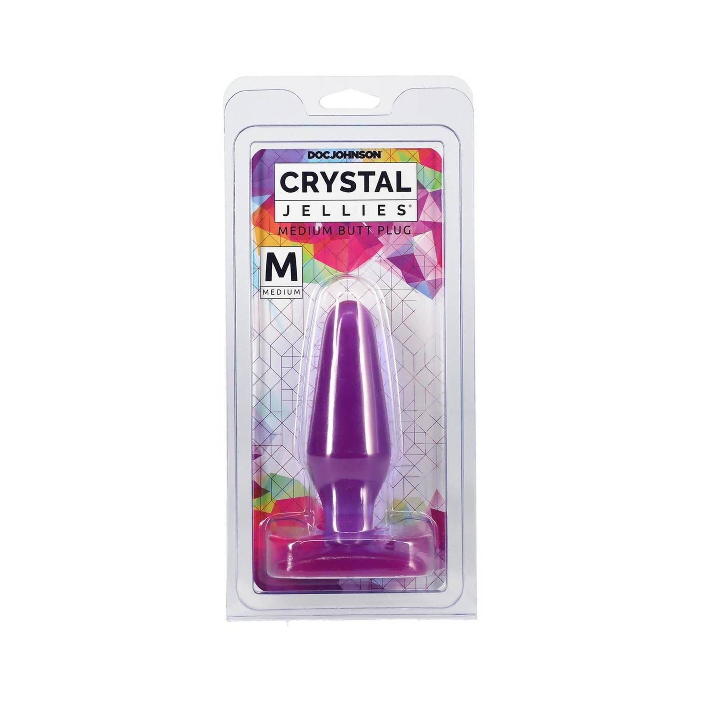 Lila Butt Plug in Verpackung. Marke: Doc Johnson. Aufschrift: Crystal Jellies, Medium Butt Plug. Größe: M.