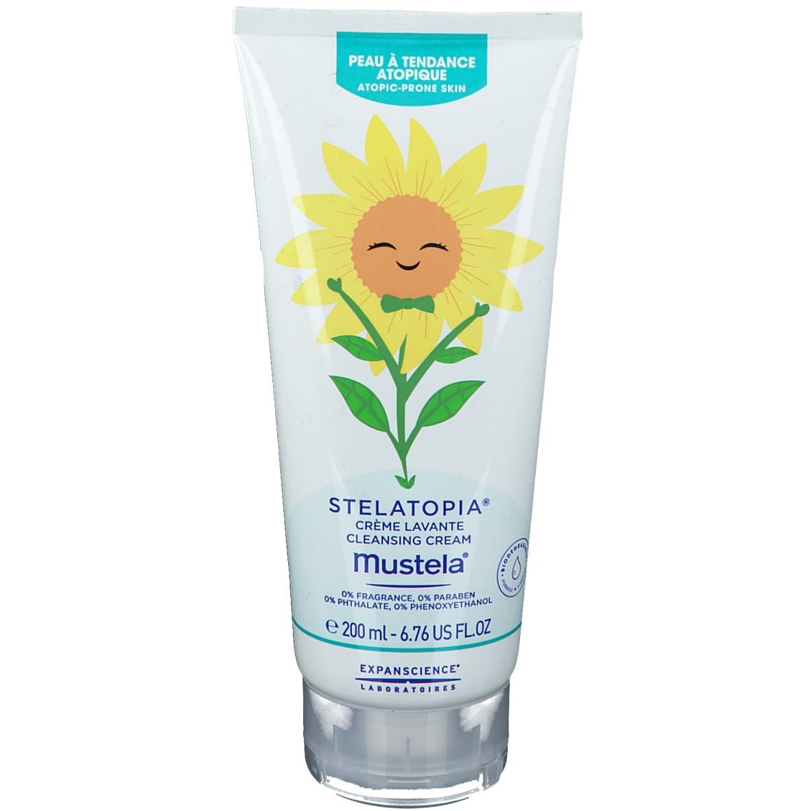 Tubo bianco con illustrazione di girasole. Testo: STELATOPIA, Crème Lavante, Mustela. 200 ml.