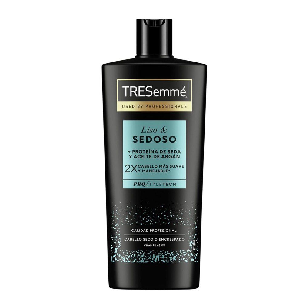 Schwarze TRESemmé Shampoo-Flasche. Aufschrift: Liso & Sedoso, Protein de Seda y Aceite de Argán. Für trockenes oder krauses Haar.