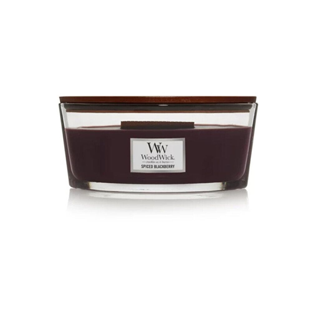 Kerze mit Holzdeckel. Violettes Wachs in Glasbehälter. Aufschrift: WoodWick Spiced Blackberry.