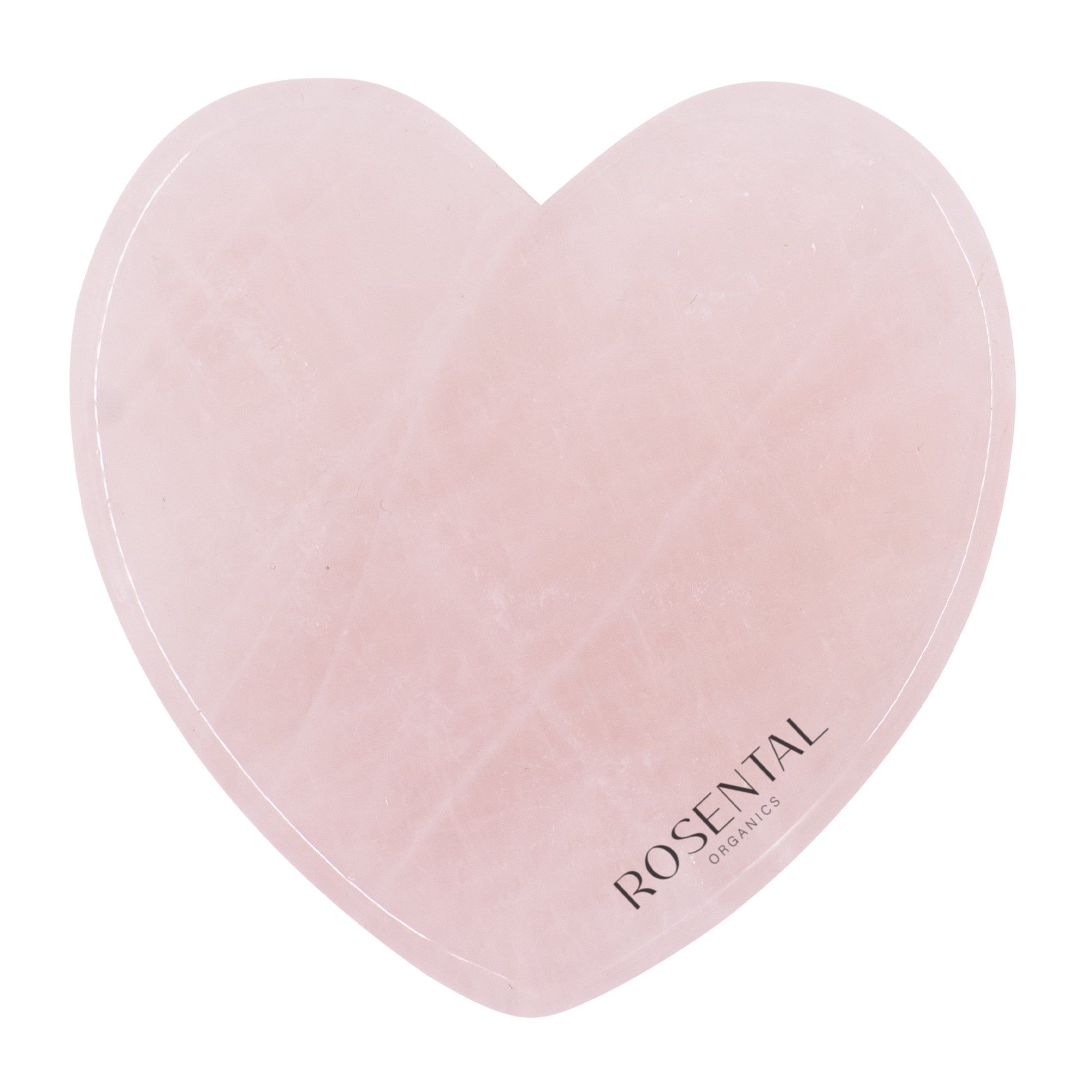 Herzförmiges Gua Sha aus Rosenquarz. Marke Rosental Organics. Rosa Stein mit abgerundeten Kanten.