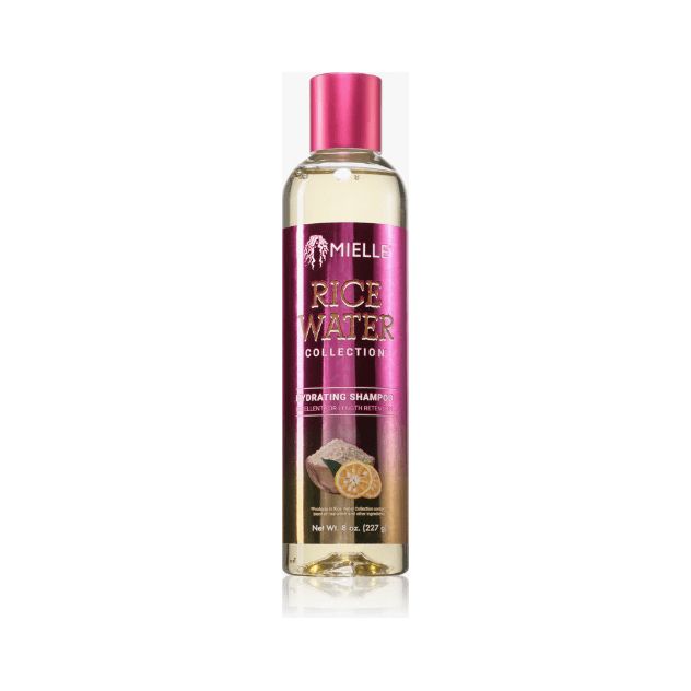 Eine Flasche Shampoo mit rosa Deckel und Etikett. Auf dem Etikett steht "Mielle Rice Water Collection".