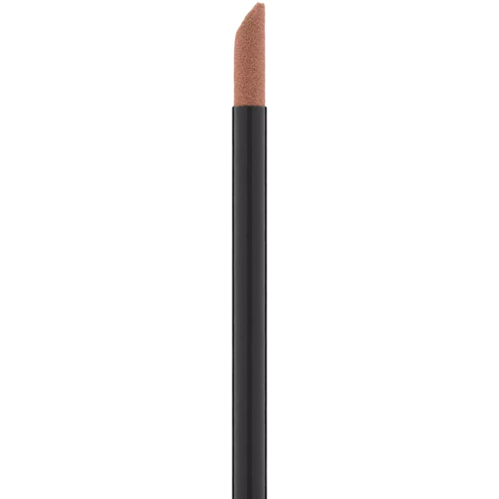 Applikator für flüssigen Lippenstift. Schwarzer Stiel, Spitze in Nude-Farbe.