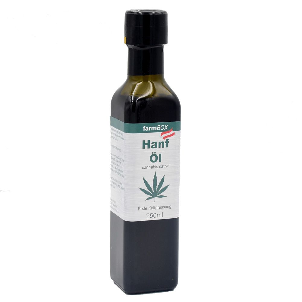 Braune Glasflasche mit schwarzem Verschluss. Etikett mit "Hanf Öl" und Hanfblatt-Symbol. "farmBOX"-Logo.