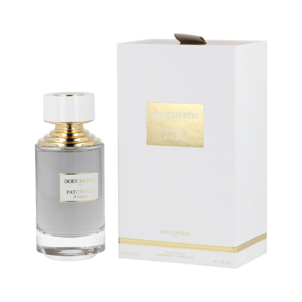 Parfümflasche und Verpackung. Weißes Etui mit goldenem Logo. Flakon mit weißem Deckel und goldenen Akzenten. Aufschrift: Boucheron, Patchouli d'Angkor.