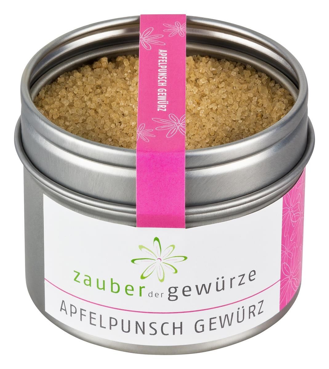 Runde Dose mit Gewürzen. Rosa Etikett mit Schriftzug 'Apfelpunsch Gewürz'. Marke 'Zauber der Gewürze'.