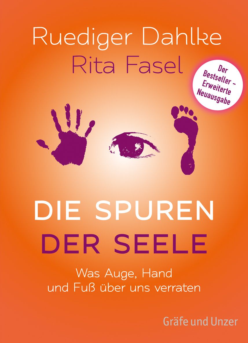 Buchcover: Titel "Die Spuren der Seele". Autoren: Ruediger Dahlke, Rita Fasel. Aufdrucke von Hand, Auge und Fuß. Orangefarbener Hintergrund.