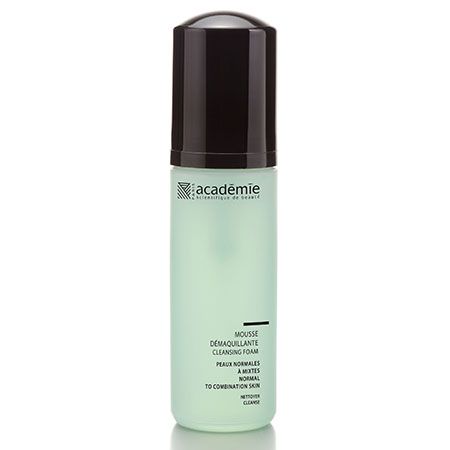 Grüne Flasche mit schwarzem Deckel. Aufschrift: Académie, Mousse Demaquillante, Cleansing Foam, für normale bis Mischhaut.
