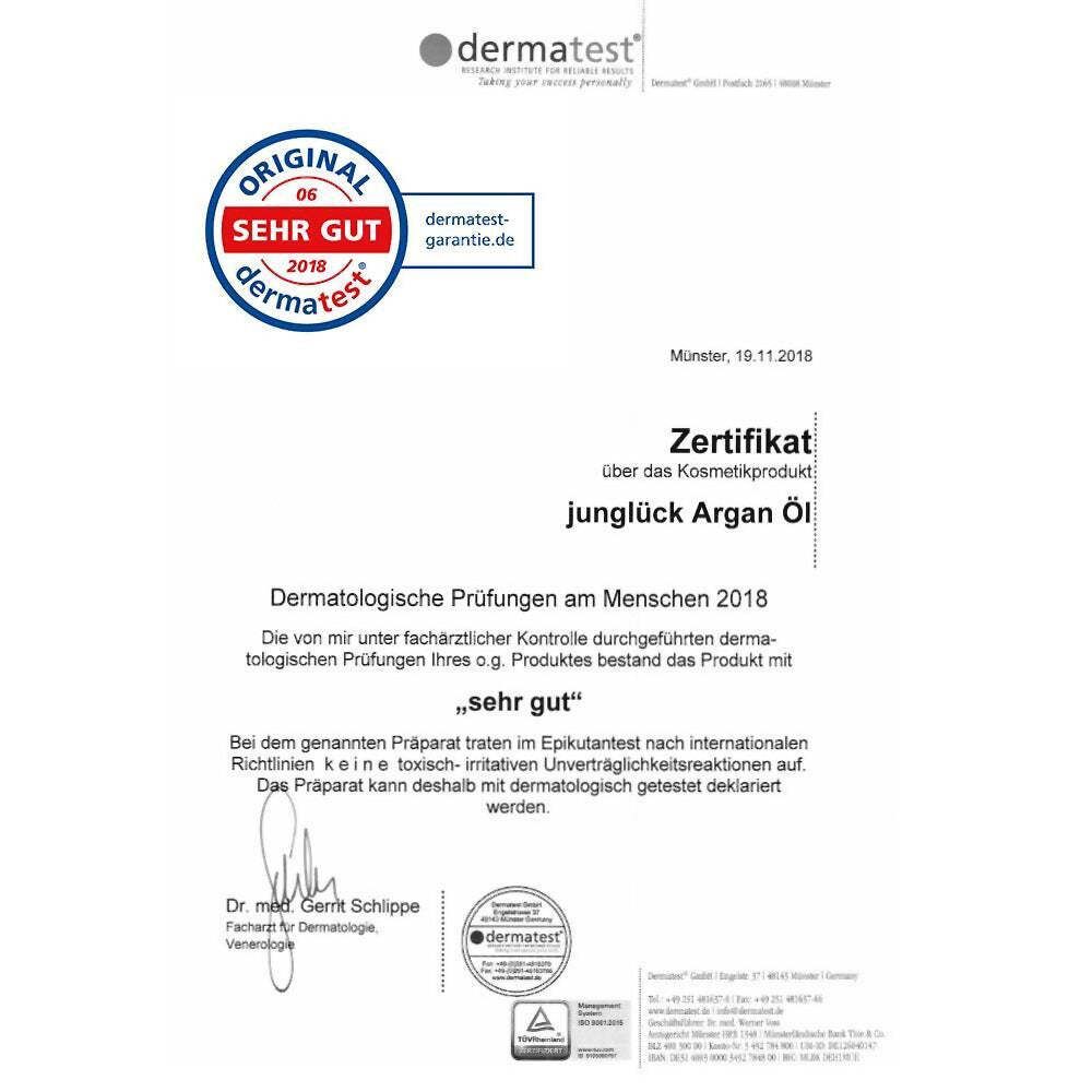 Zertifikat von Dermatest. Text: junglück Argan Öl. Ergebnis: sehr gut. Siegel: Original Dermatest.