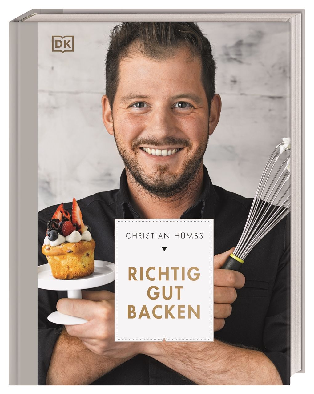 Buchcover mit Mann, Cupcake und Schneebesen. Titel: Richtig gut backen. Verlag DK.
