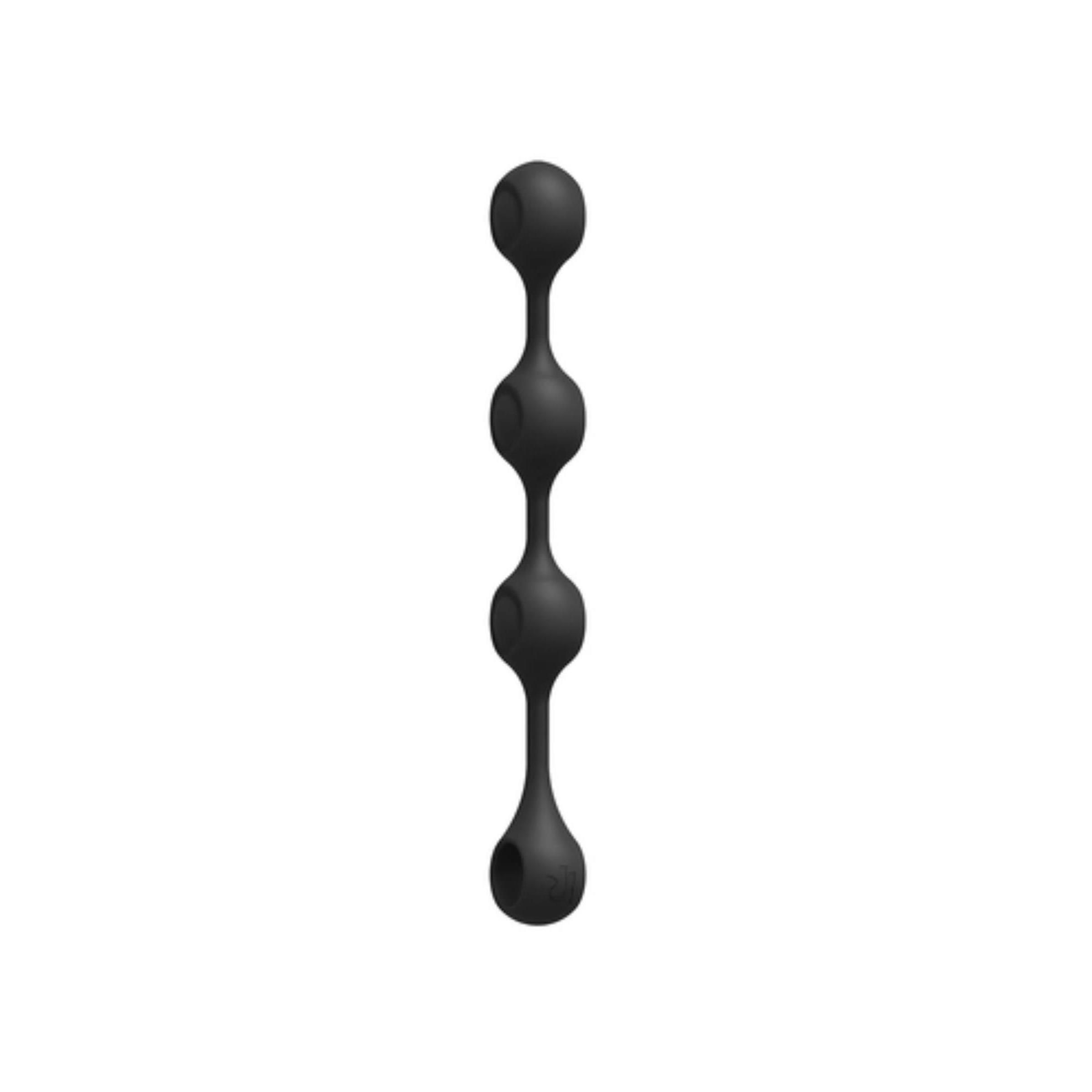 Schwarze Analkugeln aus Silikon. Drei Kugeln in einer Reihe, mit Tropfen am Ende.