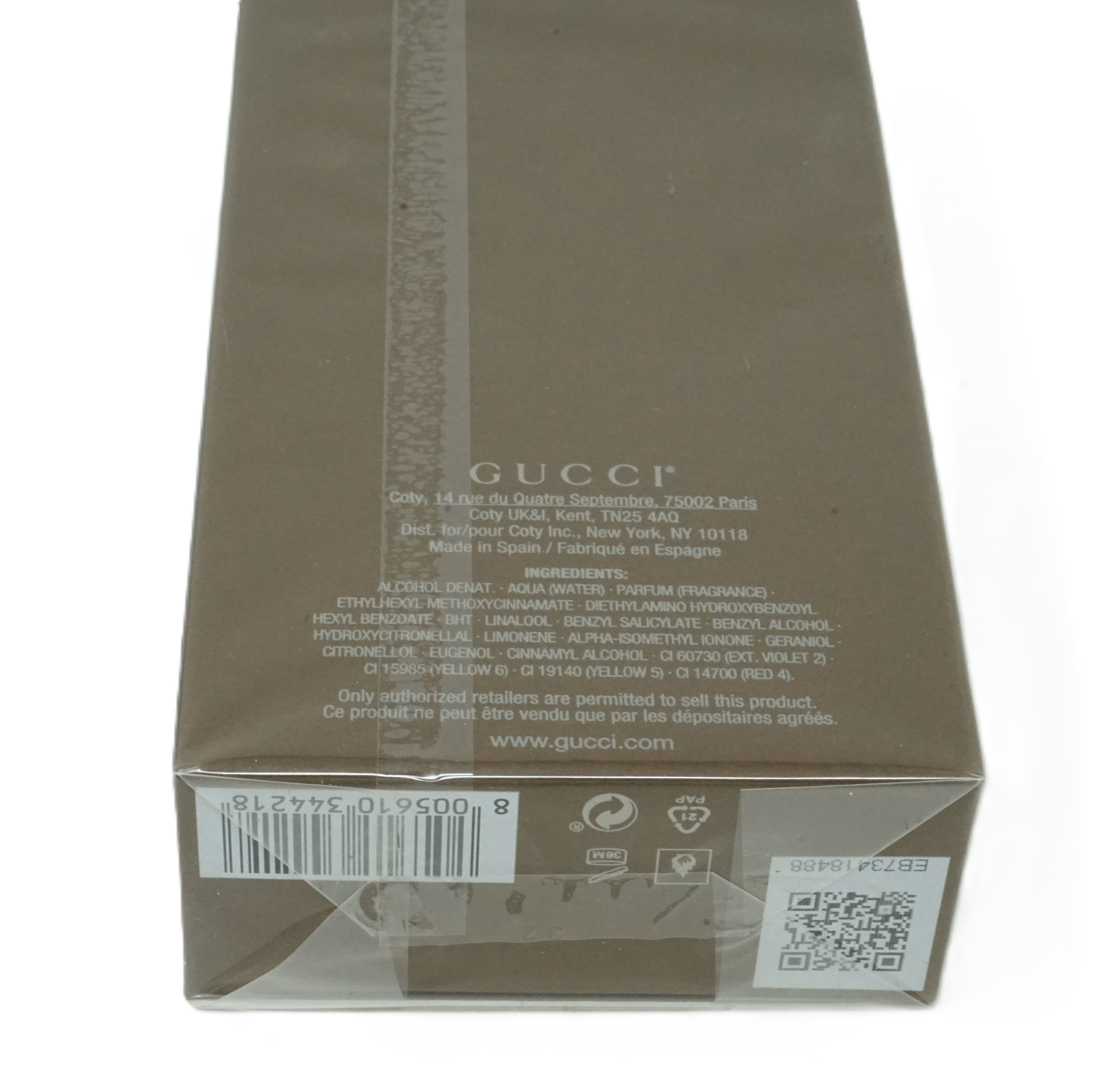 Gucci Guilty Absolute Pour Homme Eau De Parfum. Braune Verpackung, Text und Barcode. Herstellerinformationen und QR-Code.