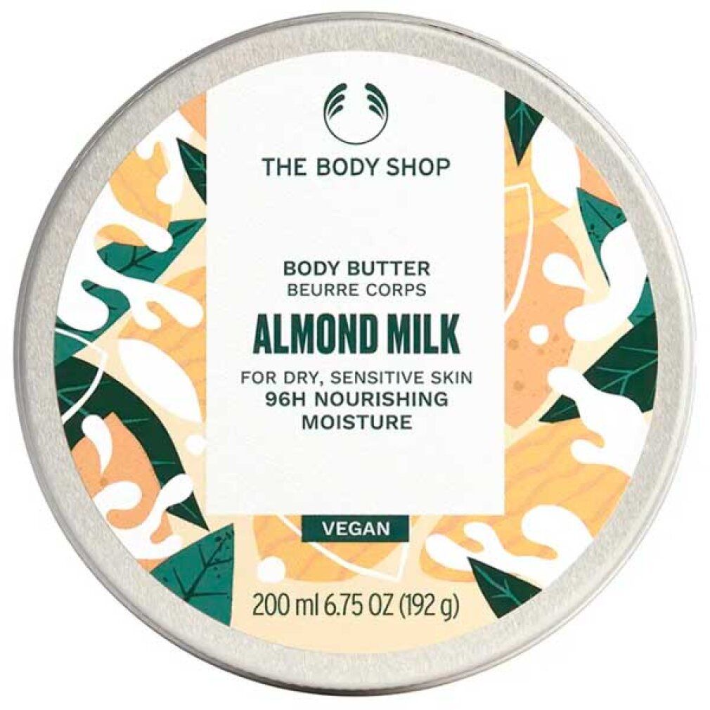 Runder Tiegel mit silbernem Deckel. Logo: The Body Shop. Aufschrift: Body Butter Almond Milk. Vegan. 200 ml.