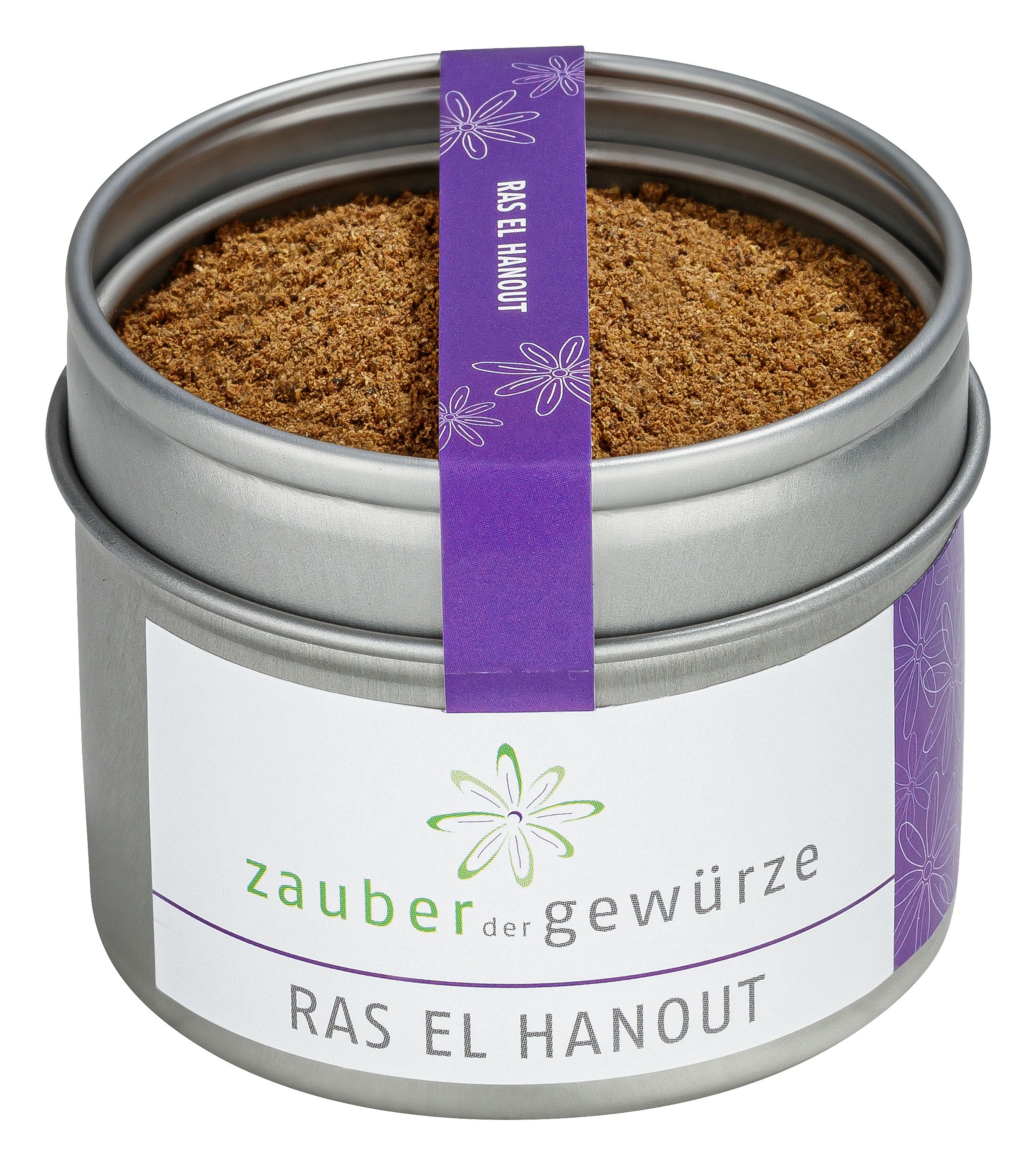 Runde Dose mit Ras el Hanout Gewürzmischung. Silberfarbenes Metall, weißes Etikett mit Produktnamen und Logo. Lila Band mit Produktname.