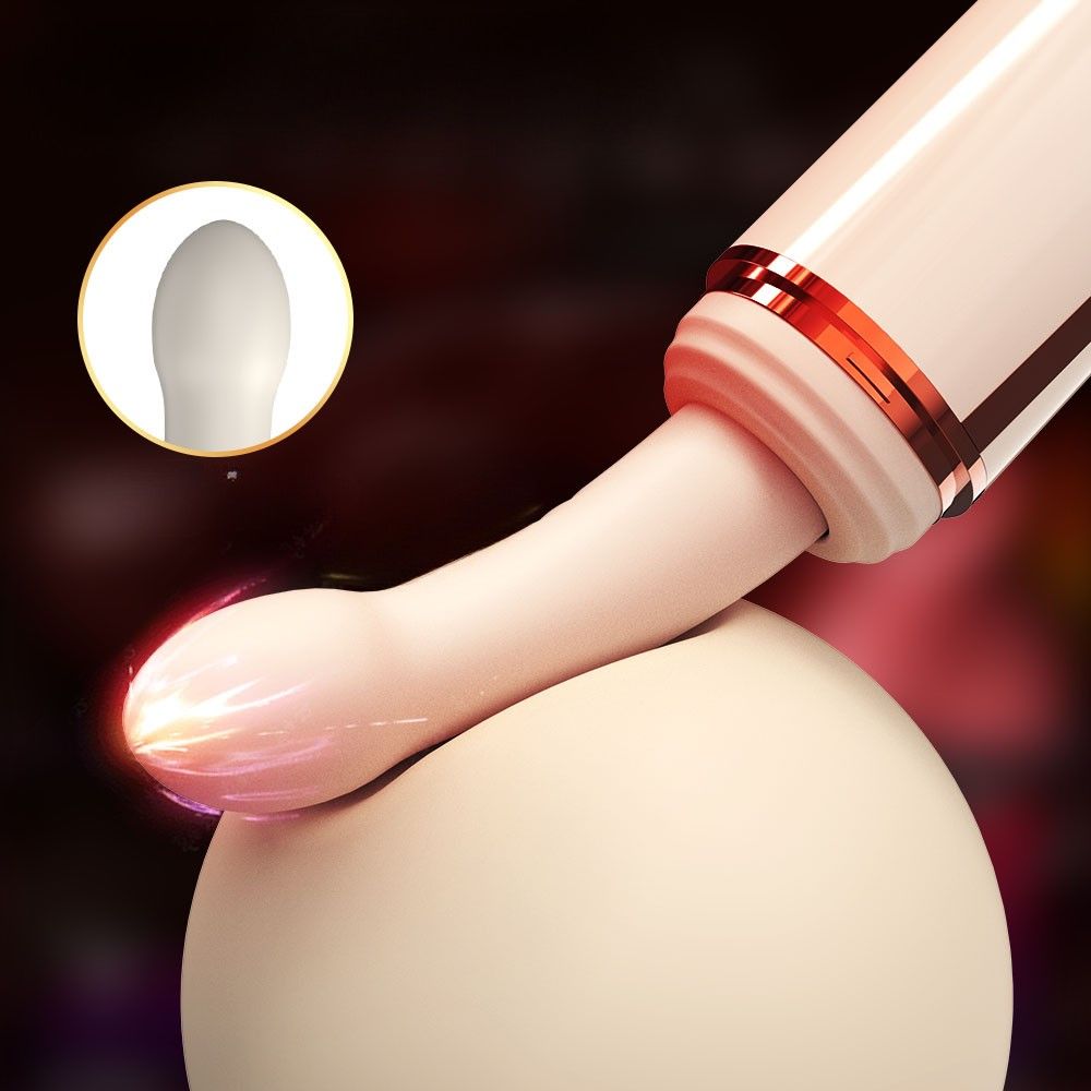 Beigefarbener Vibrator mit goldfarbenen Akzenten, mit einer Kugel.