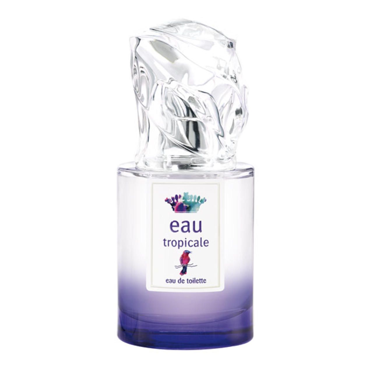 Parfümflakon mit transparentem Deckel. Auf dem Etikett: "eau tropicale" und ein Vogel. Violett-blauer Farbverlauf.