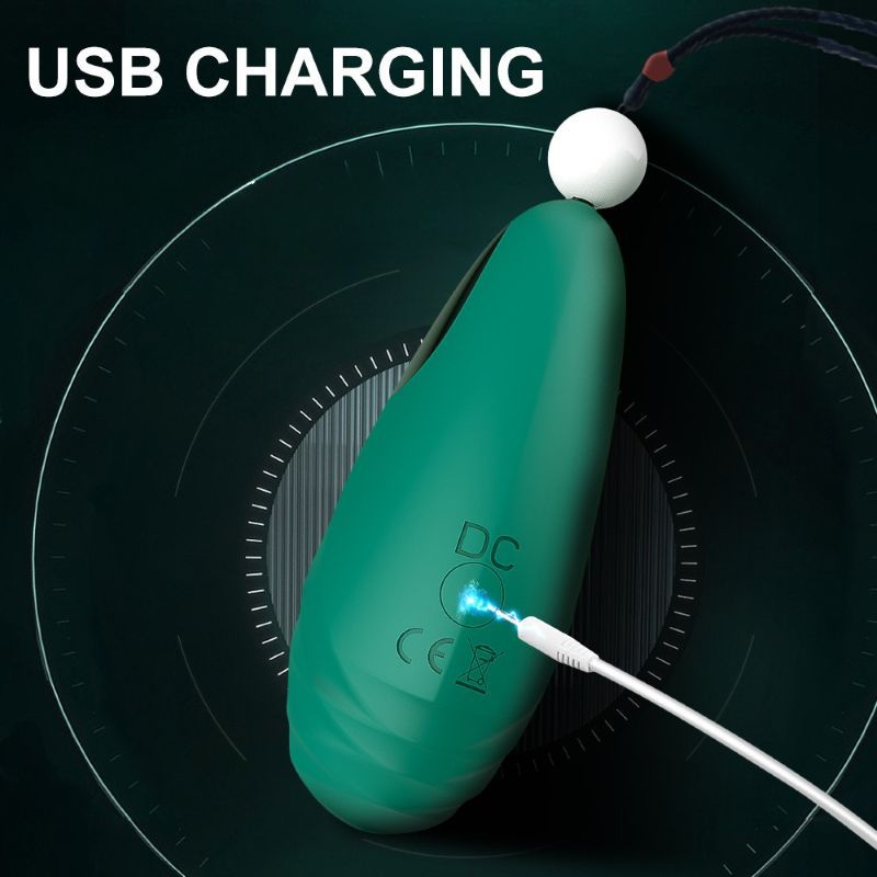 Grünes, tropfenförmiges Produkt mit weißem Ball und schwarzem Band. USB-Ladeanschluss. Text: USB CHARGING.