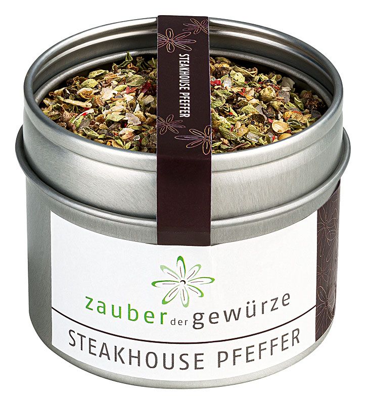 Runde Dose mit Steakhouse Pfeffer. Weißes Etikett mit Logo und Schriftzug. Brauner Streifen mit Schriftzug. Dose teilweise geöffnet.