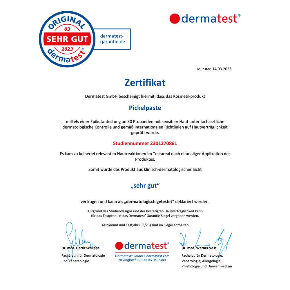 Zertifikat von Dermatest für Pickelpaste. Text: Sehr gut. Unterschriften von Ärzten. Logo Dermatest.