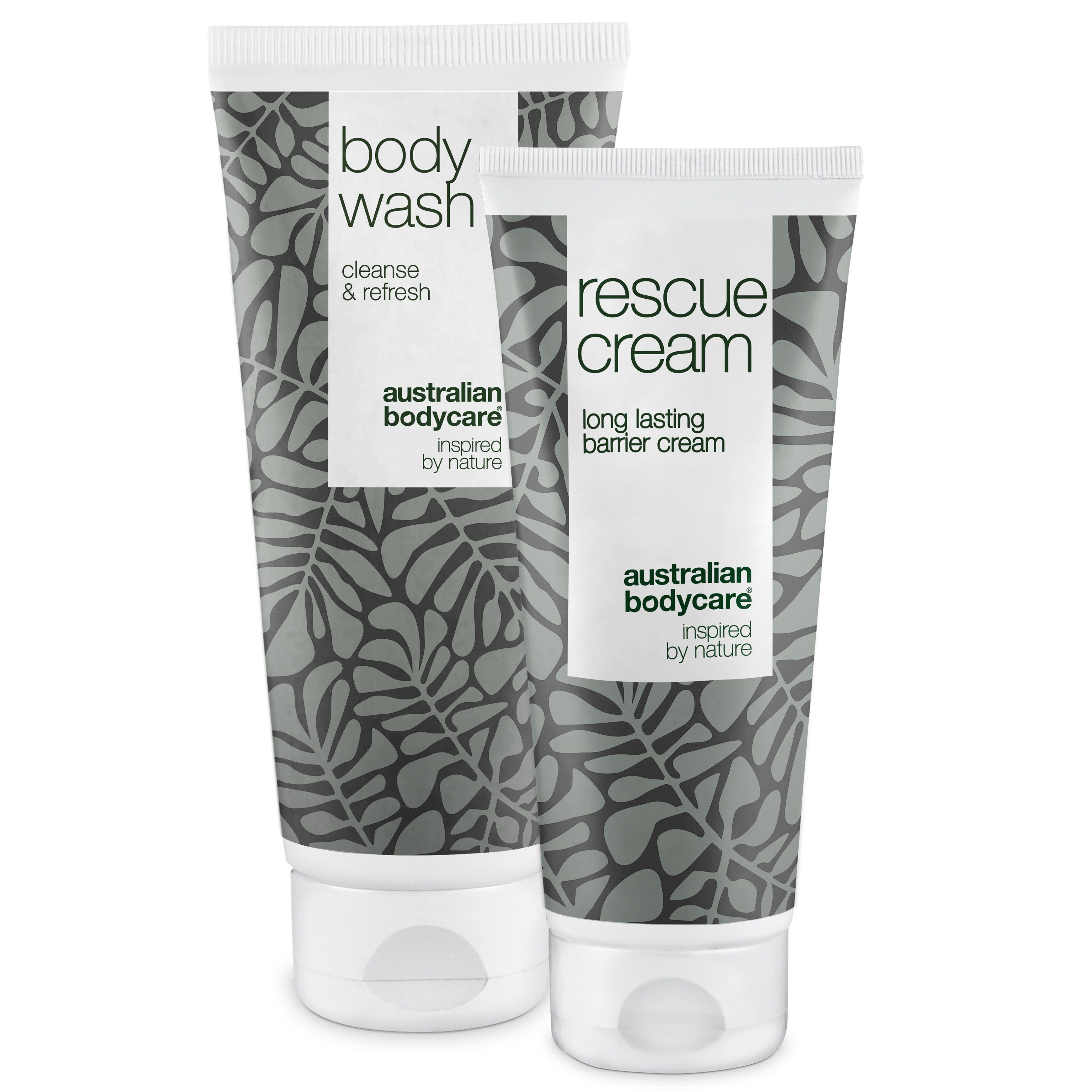 Zwei Tuben. Eine mit "Body Wash", die andere mit "Rescue Cream". Beide mit floralem Muster und weißem Deckel.