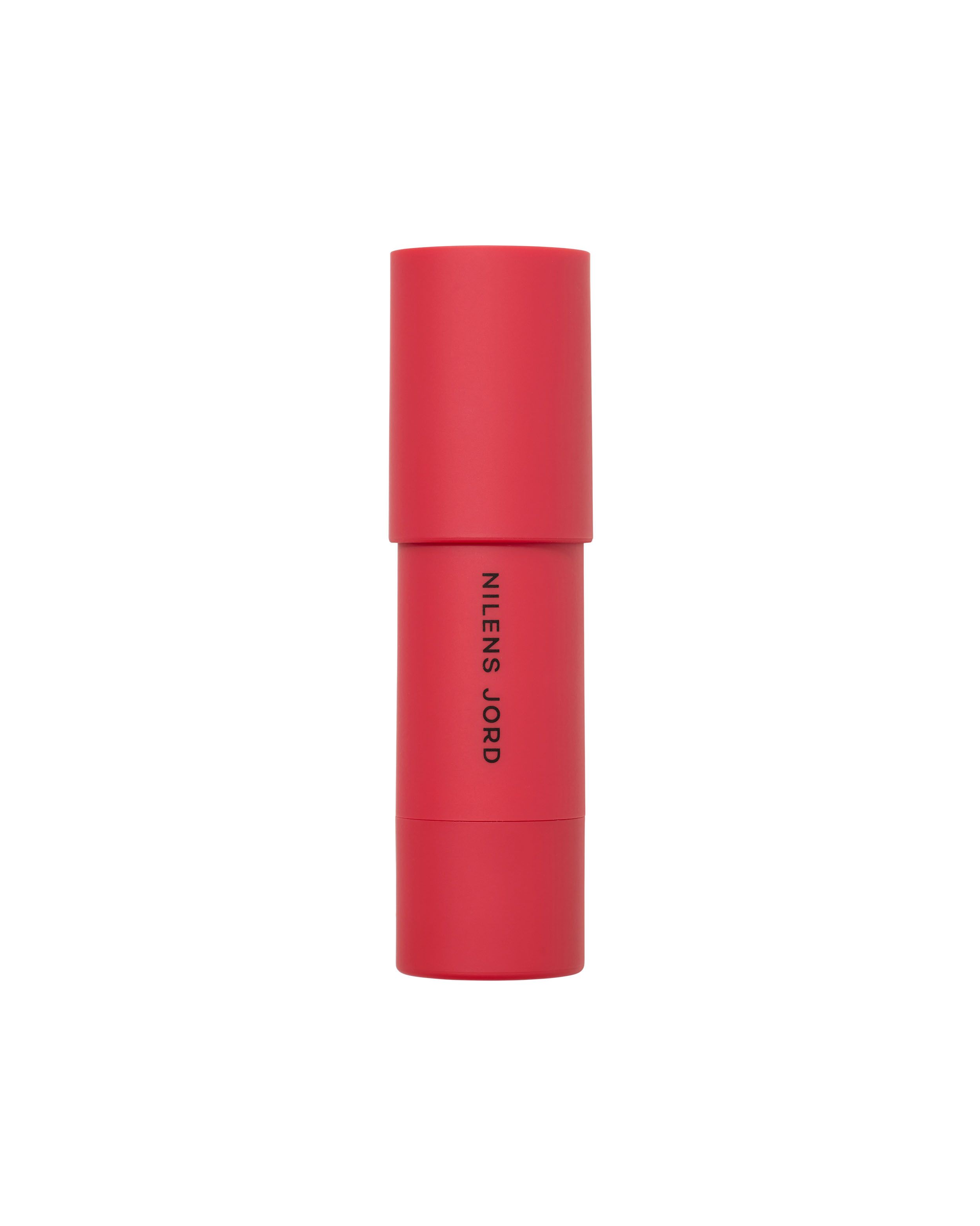 Roter Lippen- und Wangen-Stick von Nilens Jord, mit aufgesetzter Kappe.