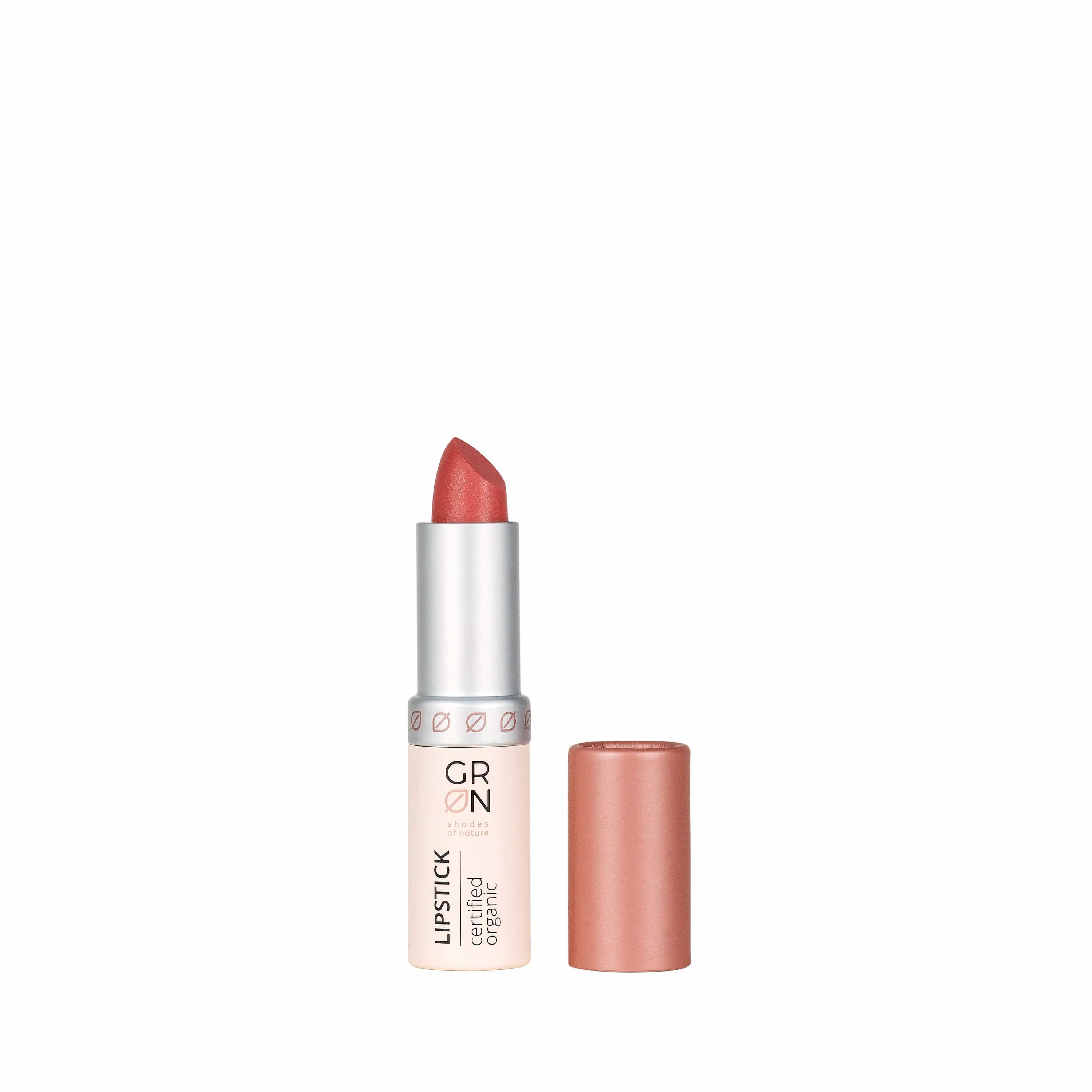 Lippenstift, geöffnet. Rosa Lippenstiftstift mit rosafarbenem Deckel. Aufschrift: GRN, Lipstick, certified organic.