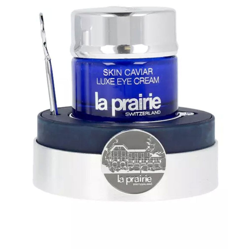 Blaues Tiegel mit silbernem Deckel und Applikator. Aufschrift: Skin Caviar Luxe Eye Cream, La Prairie.
