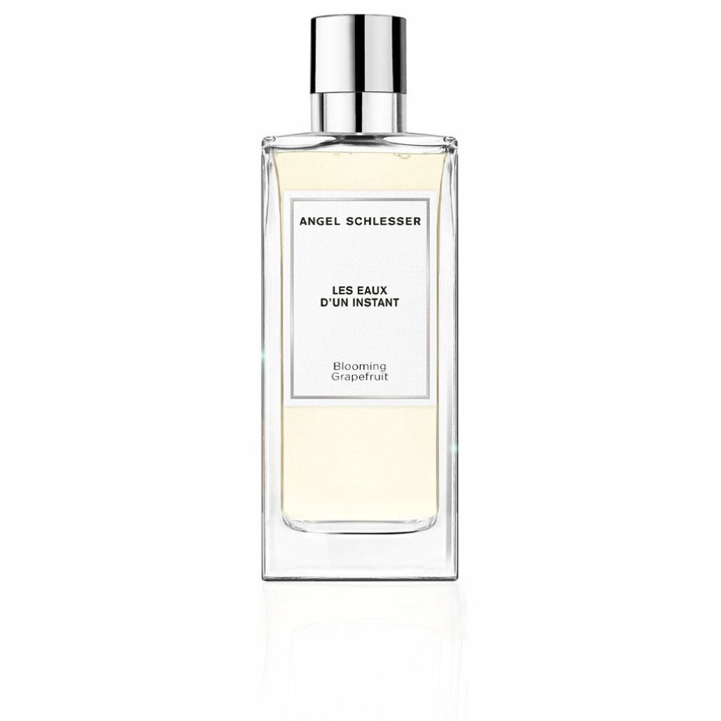 Rechteckige Glasflasche mit silbernem Verschluss. Aufschrift: Angel Schlesser, Les Eaux d'Un Instant, Blooming Grapefruit.