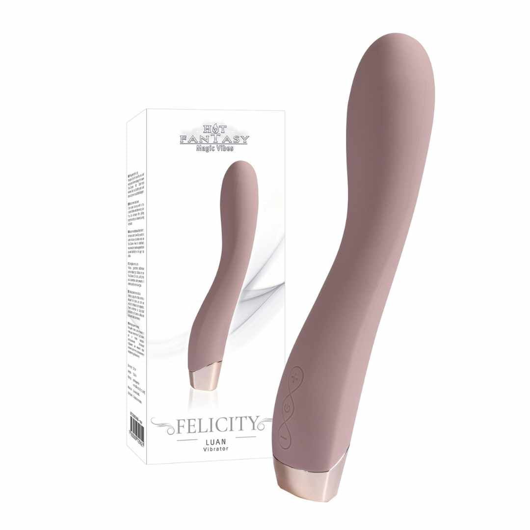 Rosa Vibrator neben Verpackung. Verpackung mit Produktabbildung und Schriftzug FELICITY. Goldfarbener Sockel.