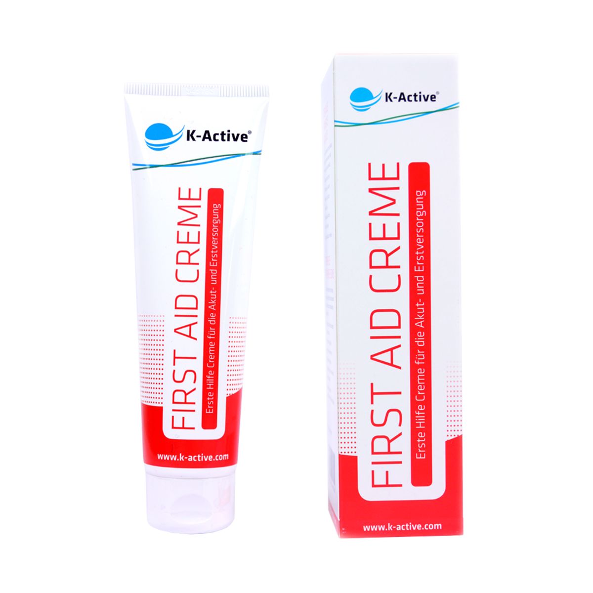 Creme-Tube und Schachtel. Aufschrift: FIRST AID CREME. Marke: K-Active. Text: Erste Hilfe Creme für die Akut- und Erstversorgung. Website-Adresse.