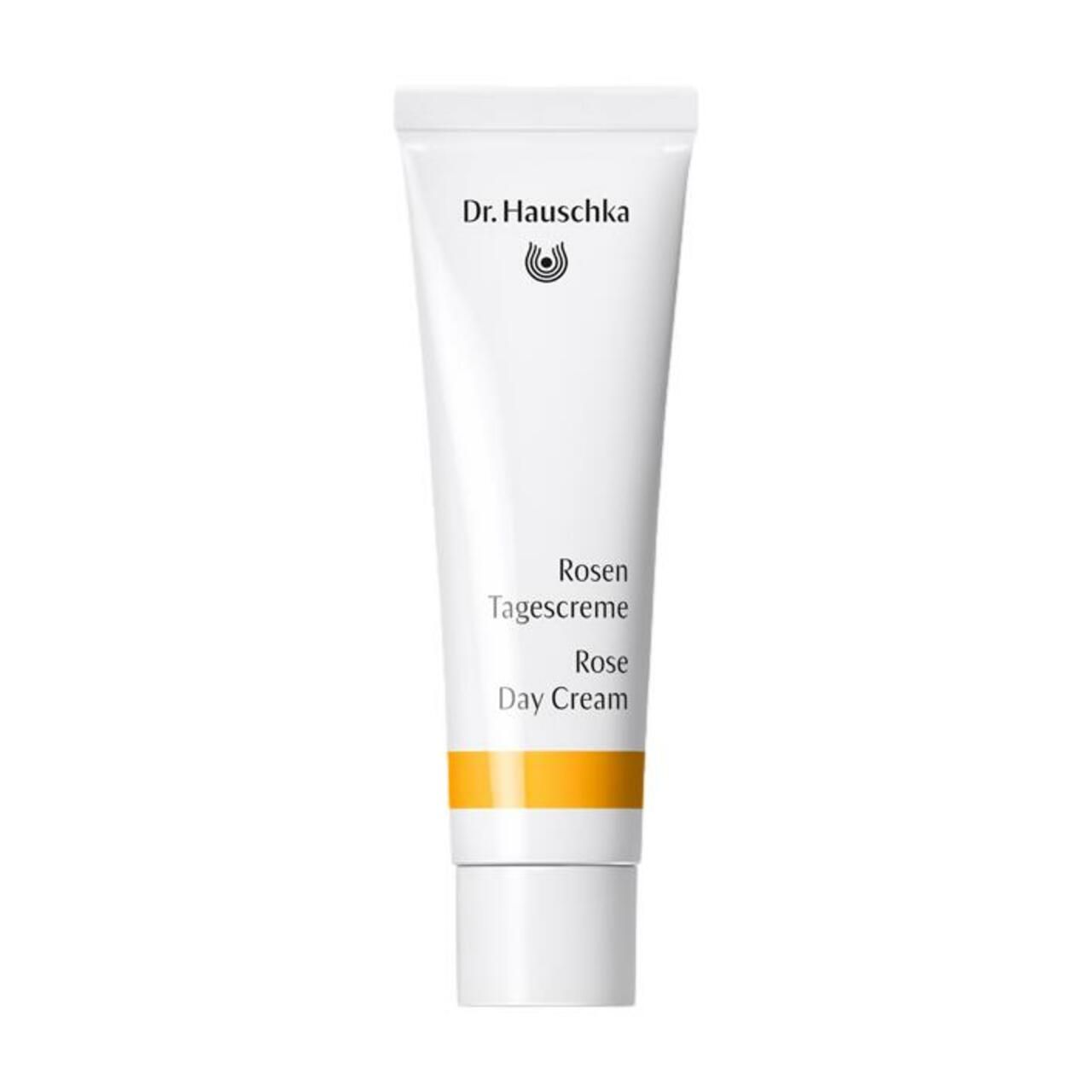 Weiße Tube mit gelbem Streifen. Beschriftung: Dr. Hauschka, Rosen Tagescreme, Rose Day Cream.