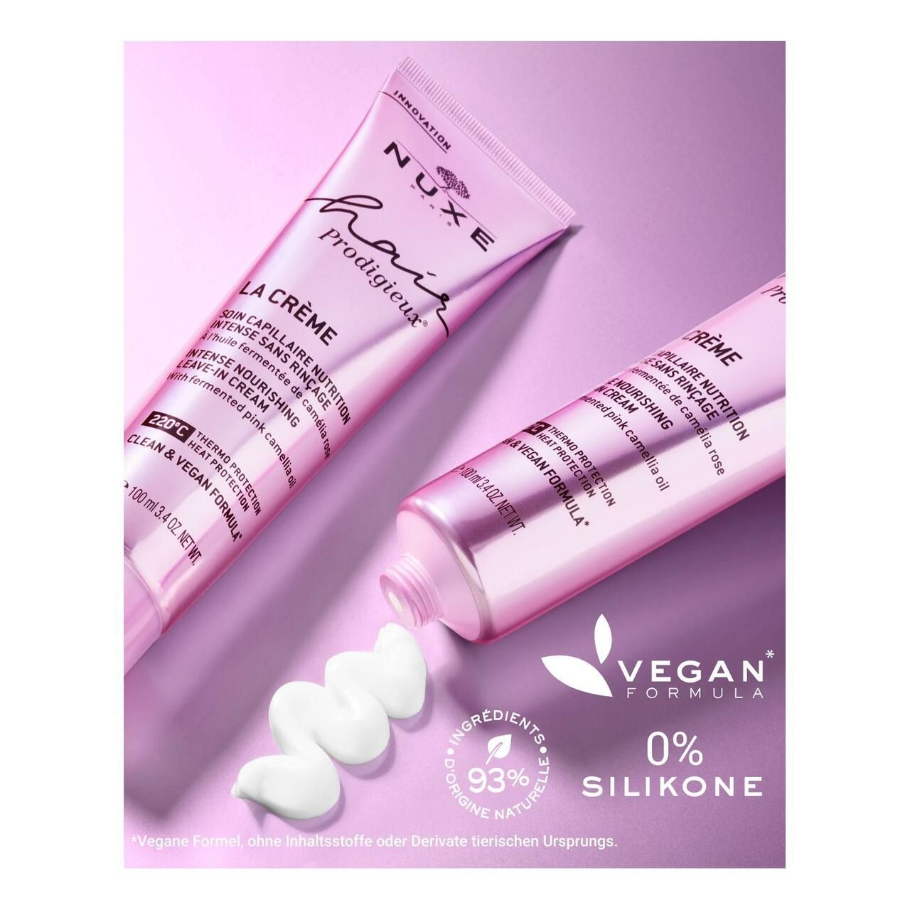 Produkt und Creme auf lila Hintergrund. Text: 93% INHALTSSTOFFE NATÜRLICHEN URSPRUNGS.