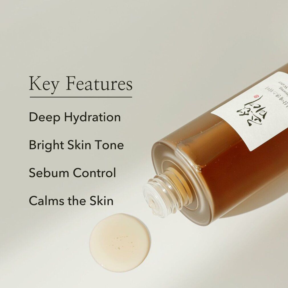 Text: Key Features. Deep Hydration, Bright Skin Tone, Sebum Control, Calms the Skin. Flüssigkeit.
