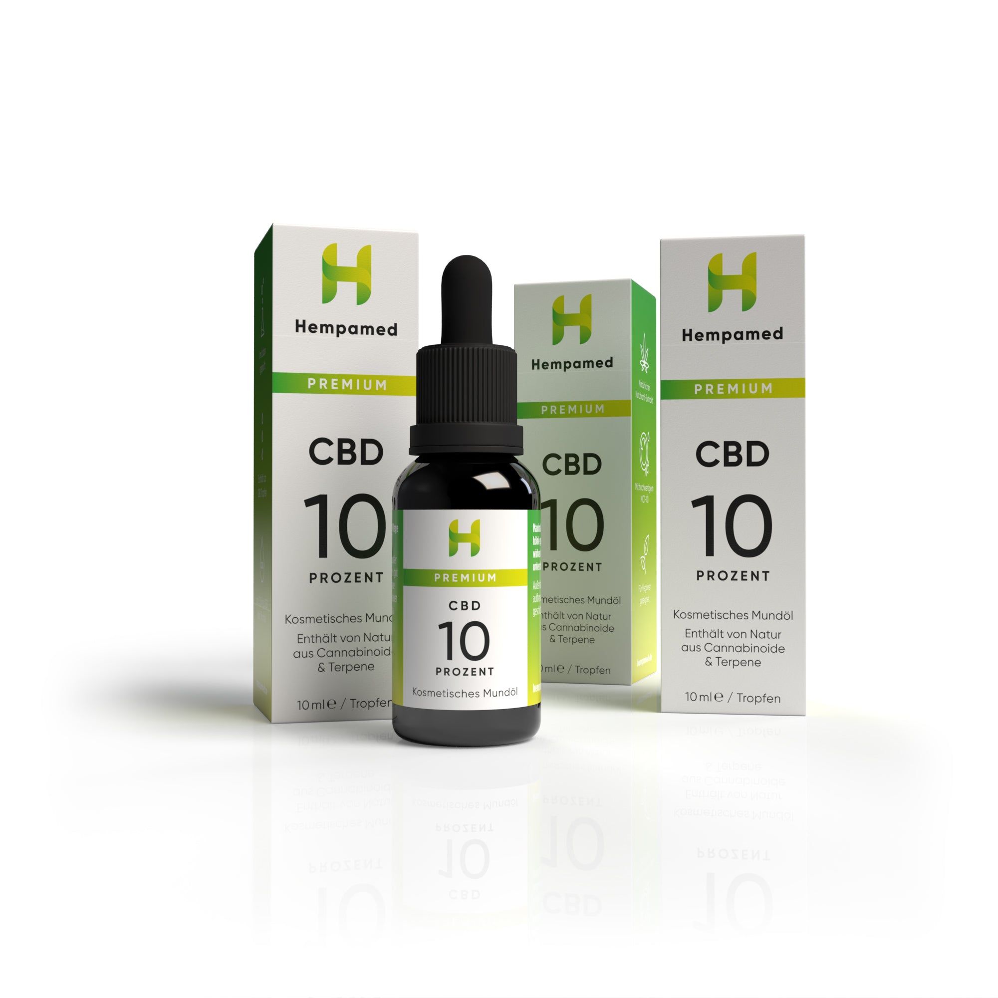Drei Flaschen und Verpackungen. Schwarze Flasche mit Tropfer, daneben zwei Verpackungen. Aufschrift: CBD 10 Prozent.