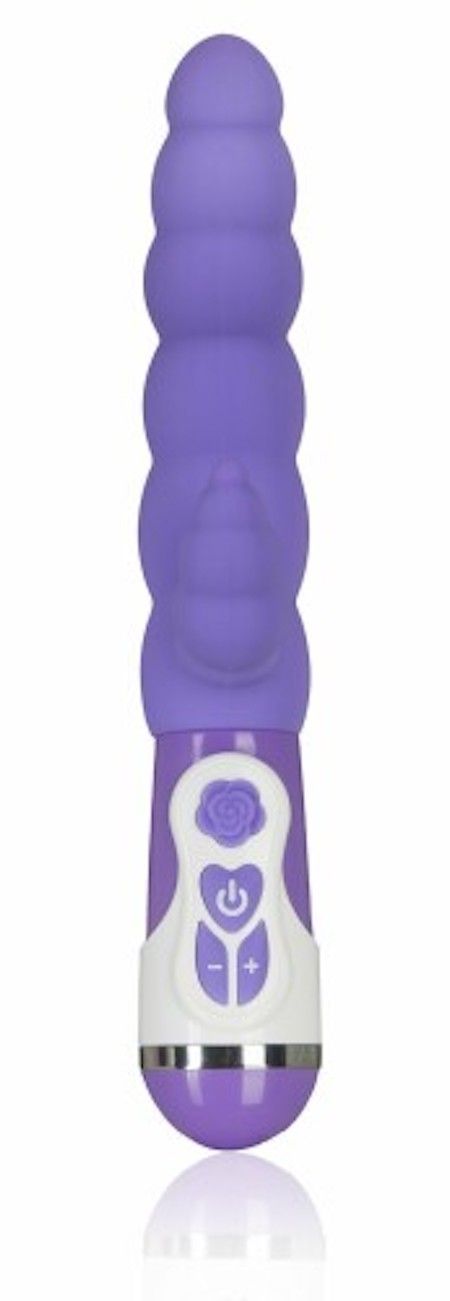 Lila Vibrator mit geriffelter Oberfläche und zusätzlichem Aufsatz. Weißer Griff mit Knöpfen und Rosenmuster.