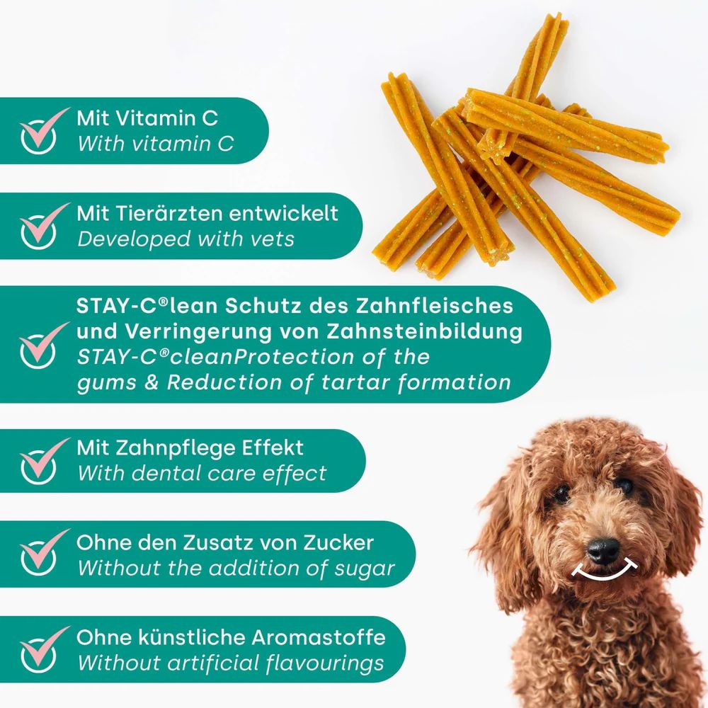 Gelb-braune Sticks neben einem Hund. Text mit Produktvorteilen.